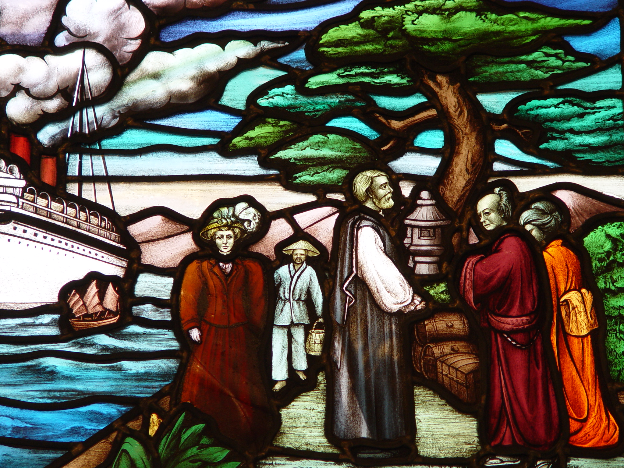 Stain glass depicting The Rev. and Mrs. James Cooper Robinson arrived in Japan on September 15, 1889