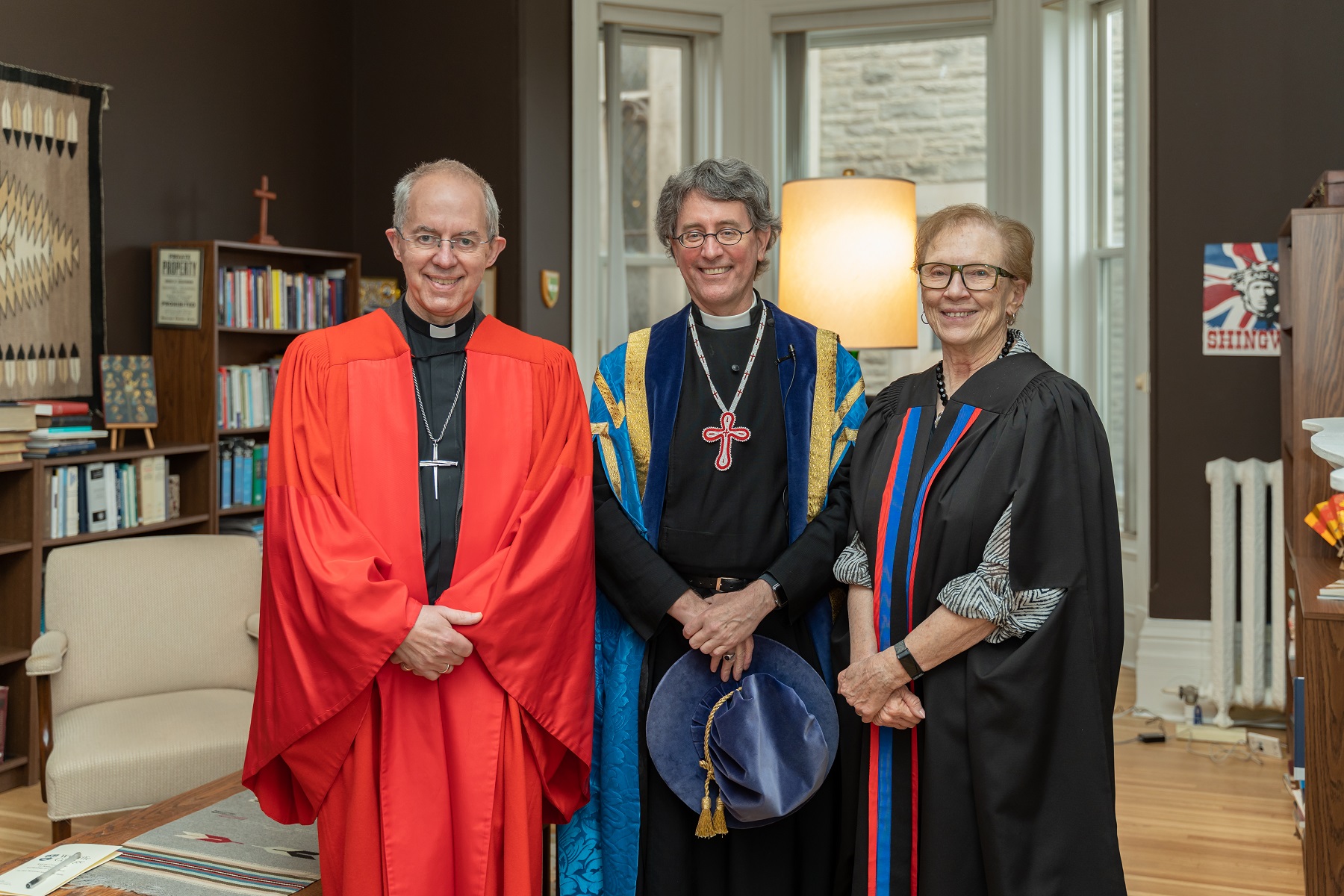 Justin Welby is pictured on May 3 with Stephen Andrews and Carol Boettcher