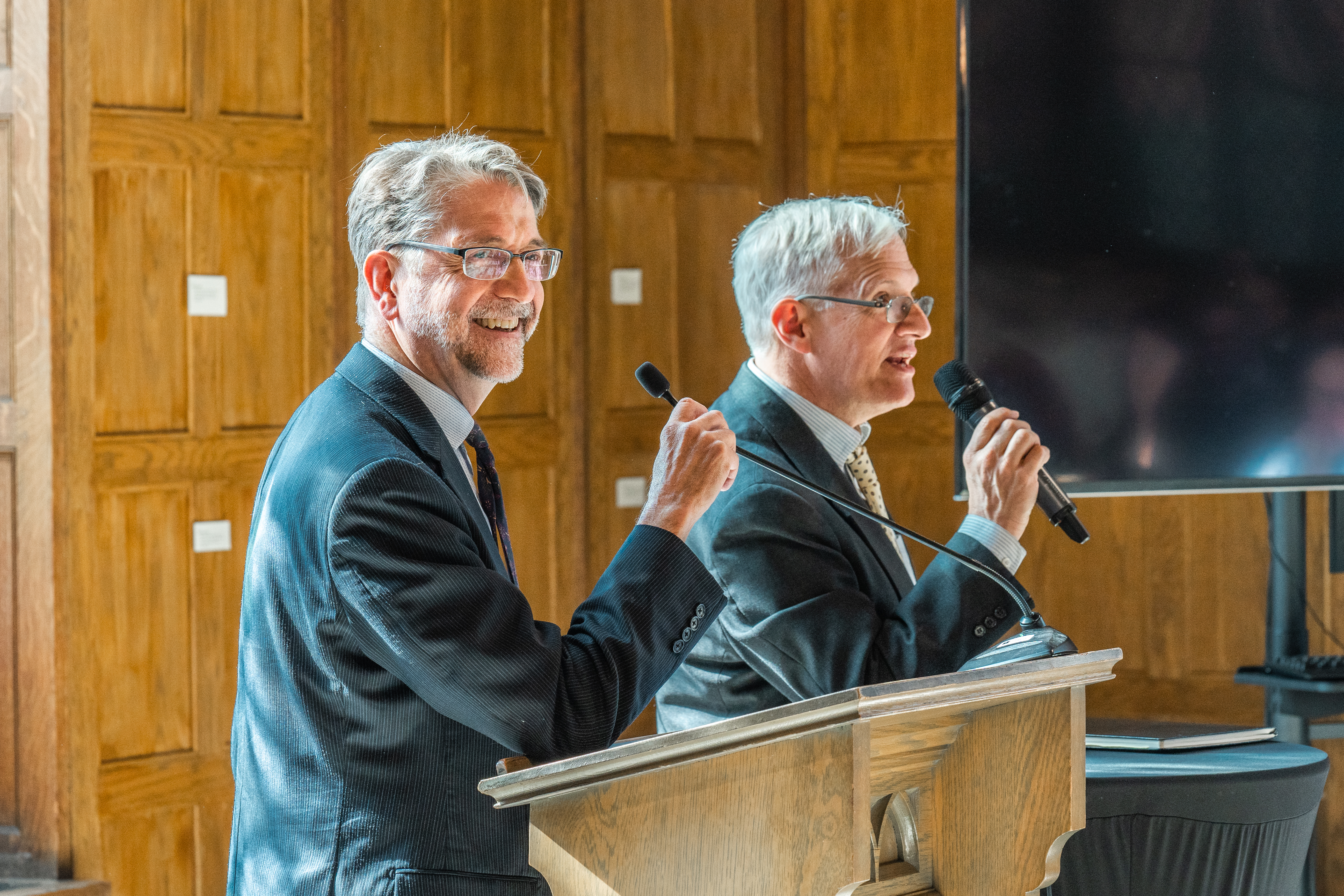 Professors at the podium Professors Ephraim Radner and Joseph Mangina