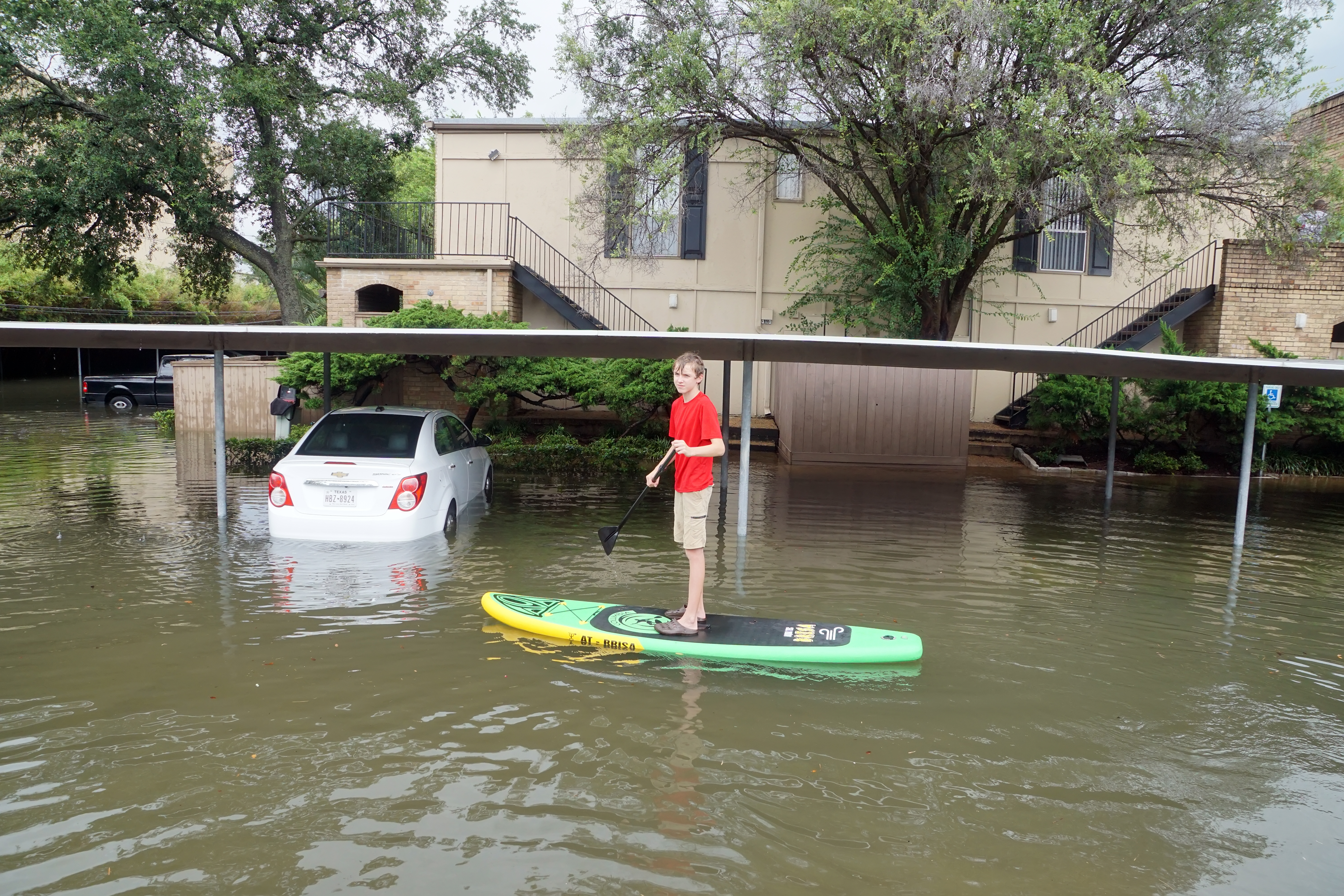 A flooded residential neighbourhood in Houston, Texas A flooded neighbourhood in Houston, Texas
