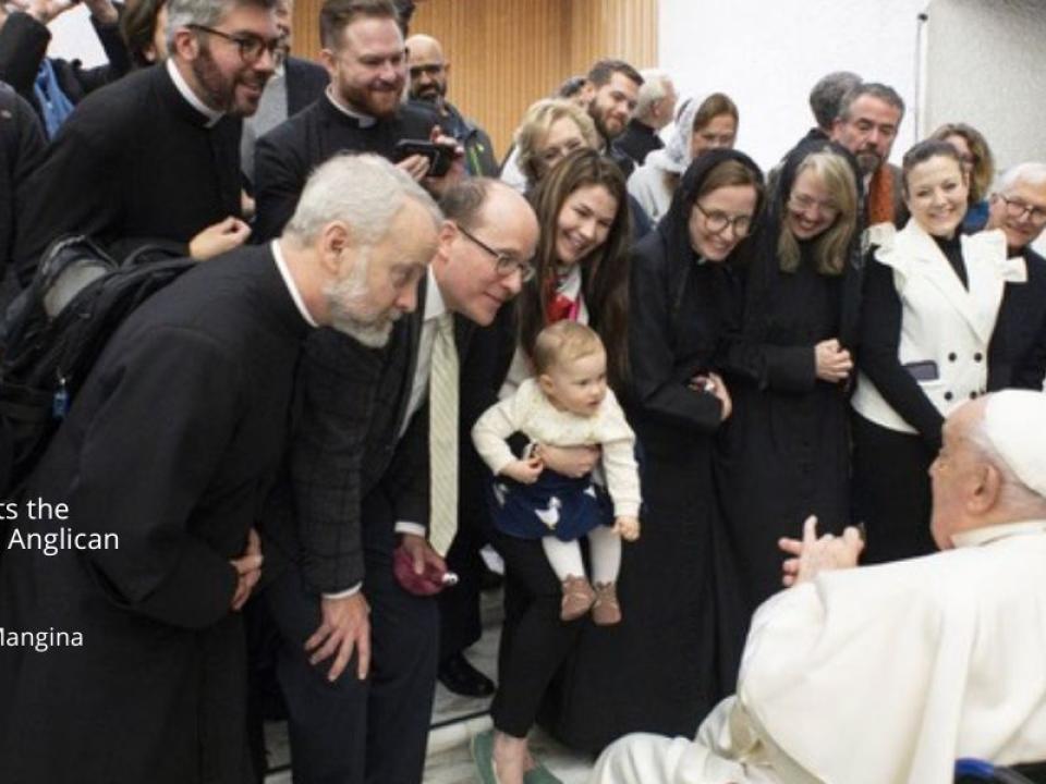 Pope Francis greets a baby - January 2025