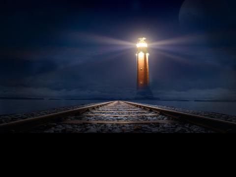God's words are like the light on side of railway track lighting the way in the dark