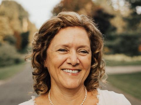 M Moolman outside on road with autumn background