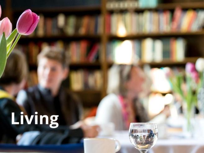 vase of tulips on table in foreground at Great Hall