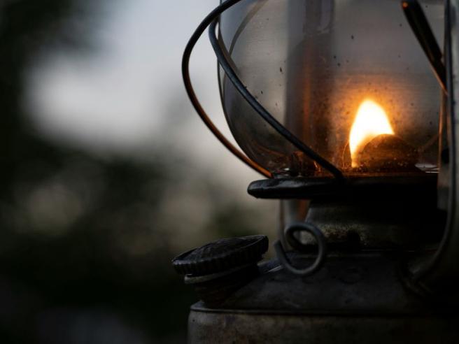 lamp shining at dusk