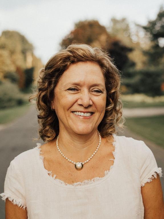 M Moolman outside on road with autumn background