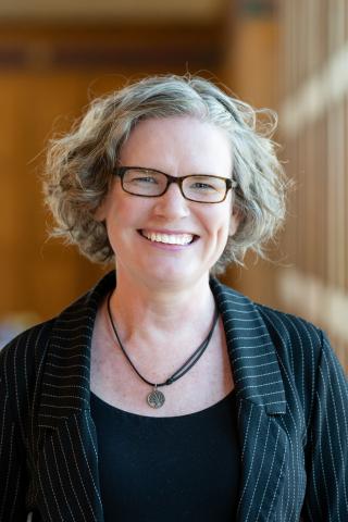 Amanda Ross in Great Hall with wooden panelling (2025-v2)