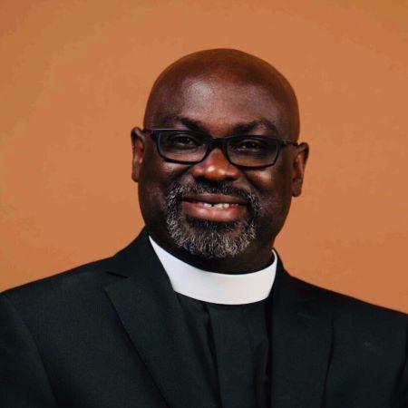 Wilson Akinwale  in clerical collar